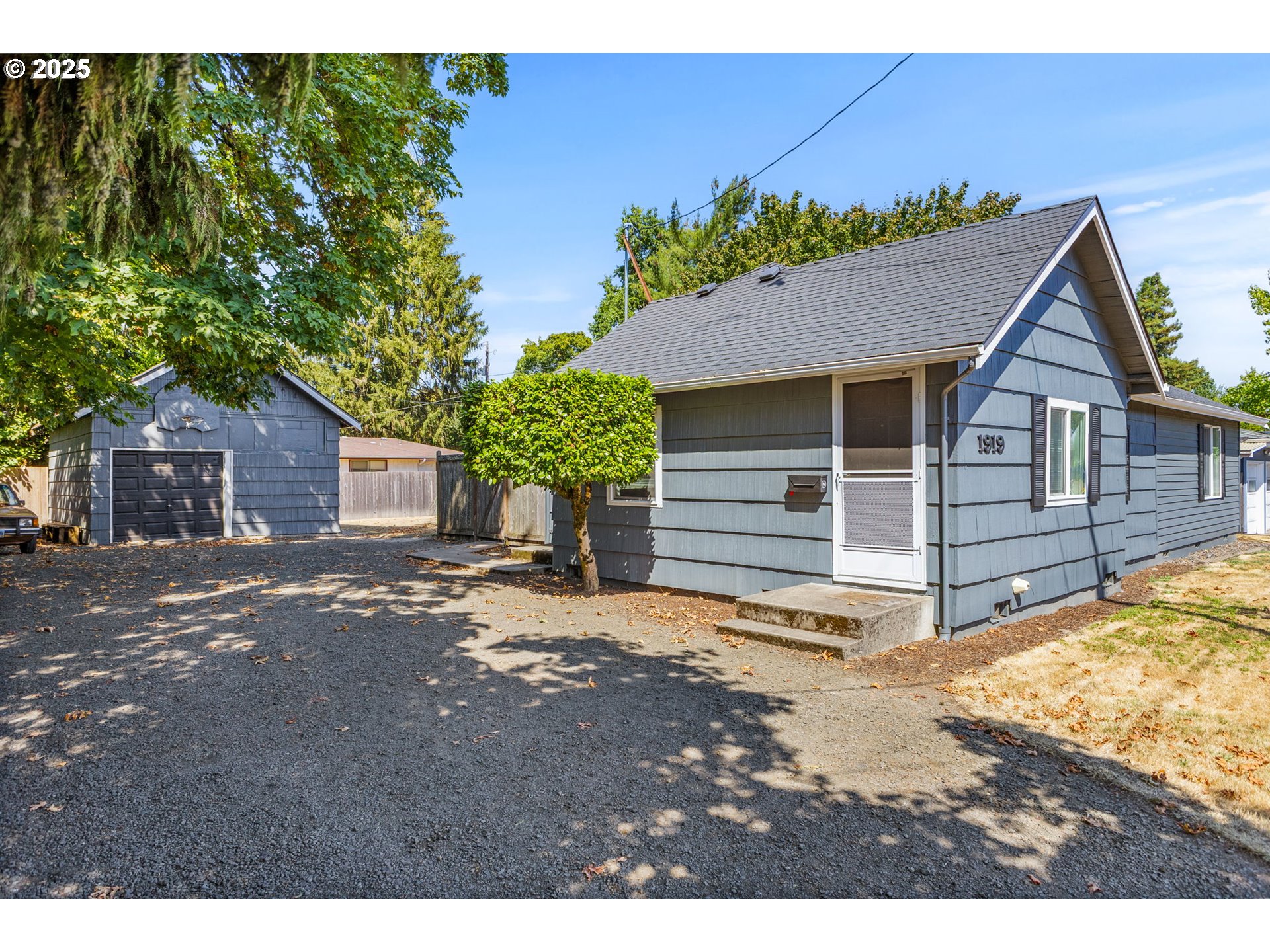 1919 Northwest Buchanan Avenue Corvallis, OR 97330 - Photo 2 of 30 a view of a house with a yard