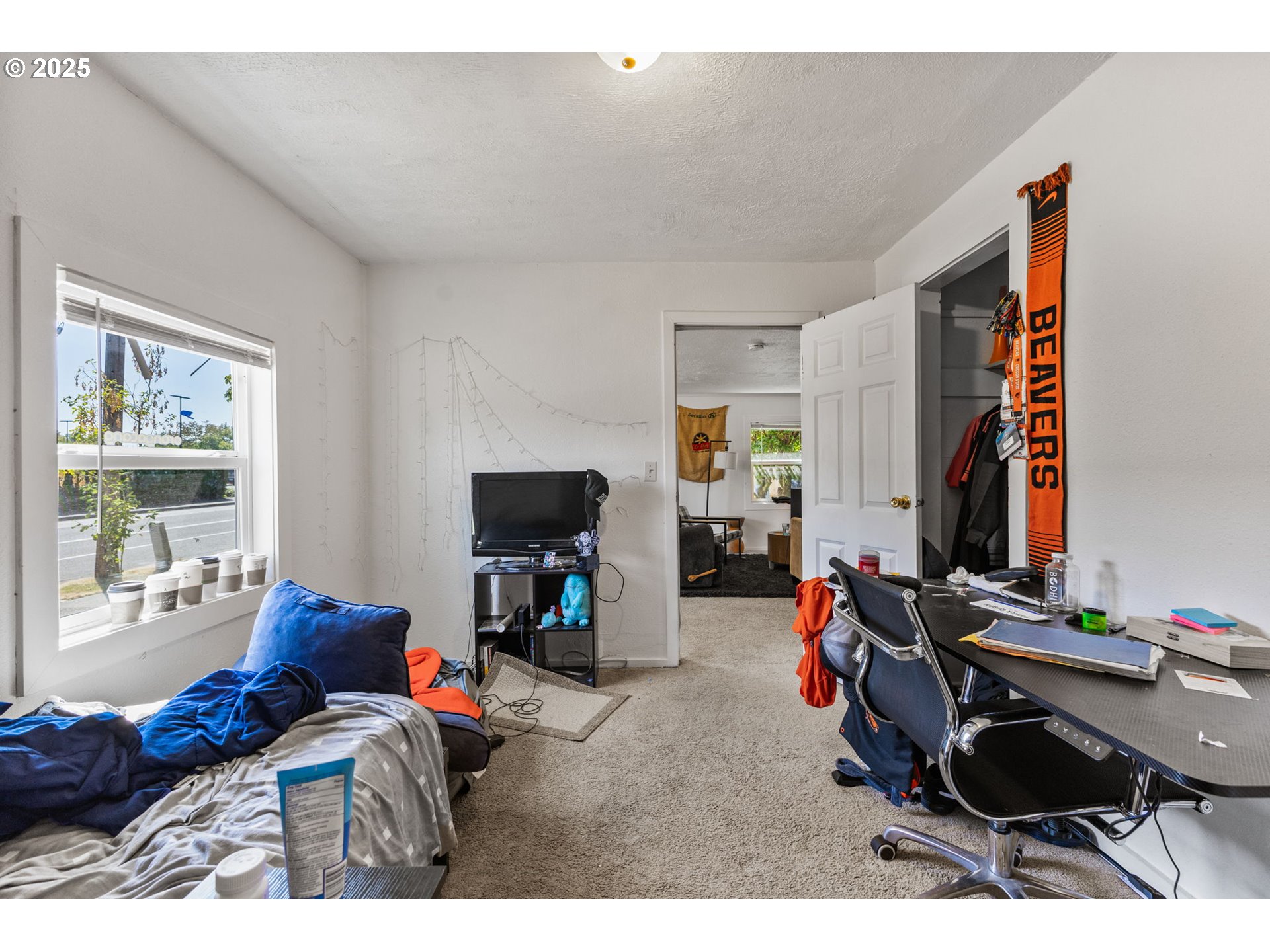 1919 Northwest Buchanan Avenue Corvallis, OR 97330 - Photo 22 of 30 a bedroom with furniture and a window