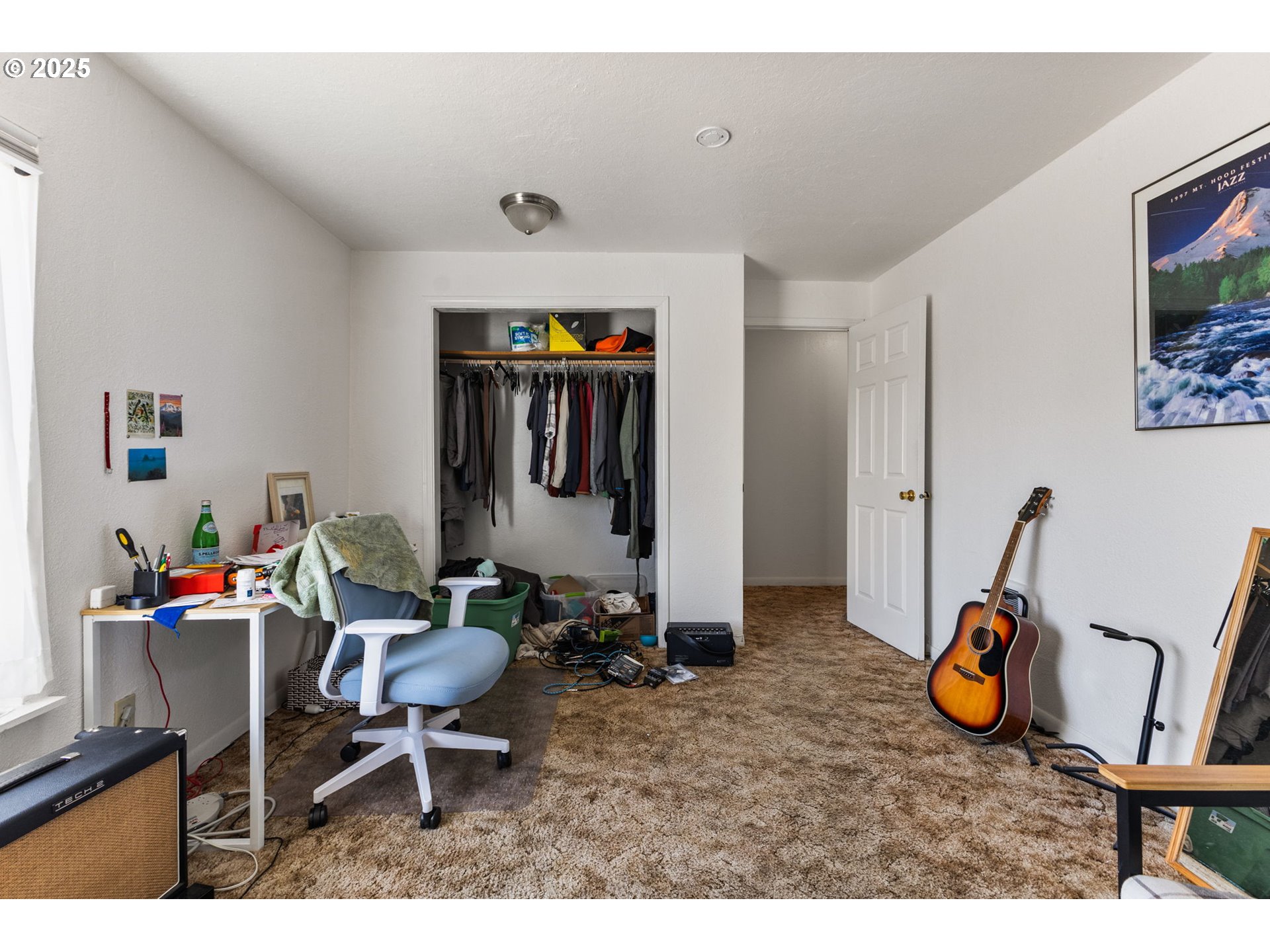 1919 Northwest Buchanan Avenue Corvallis, OR 97330 - Photo 25 of 30 a living room with furniture a window and gym equipment