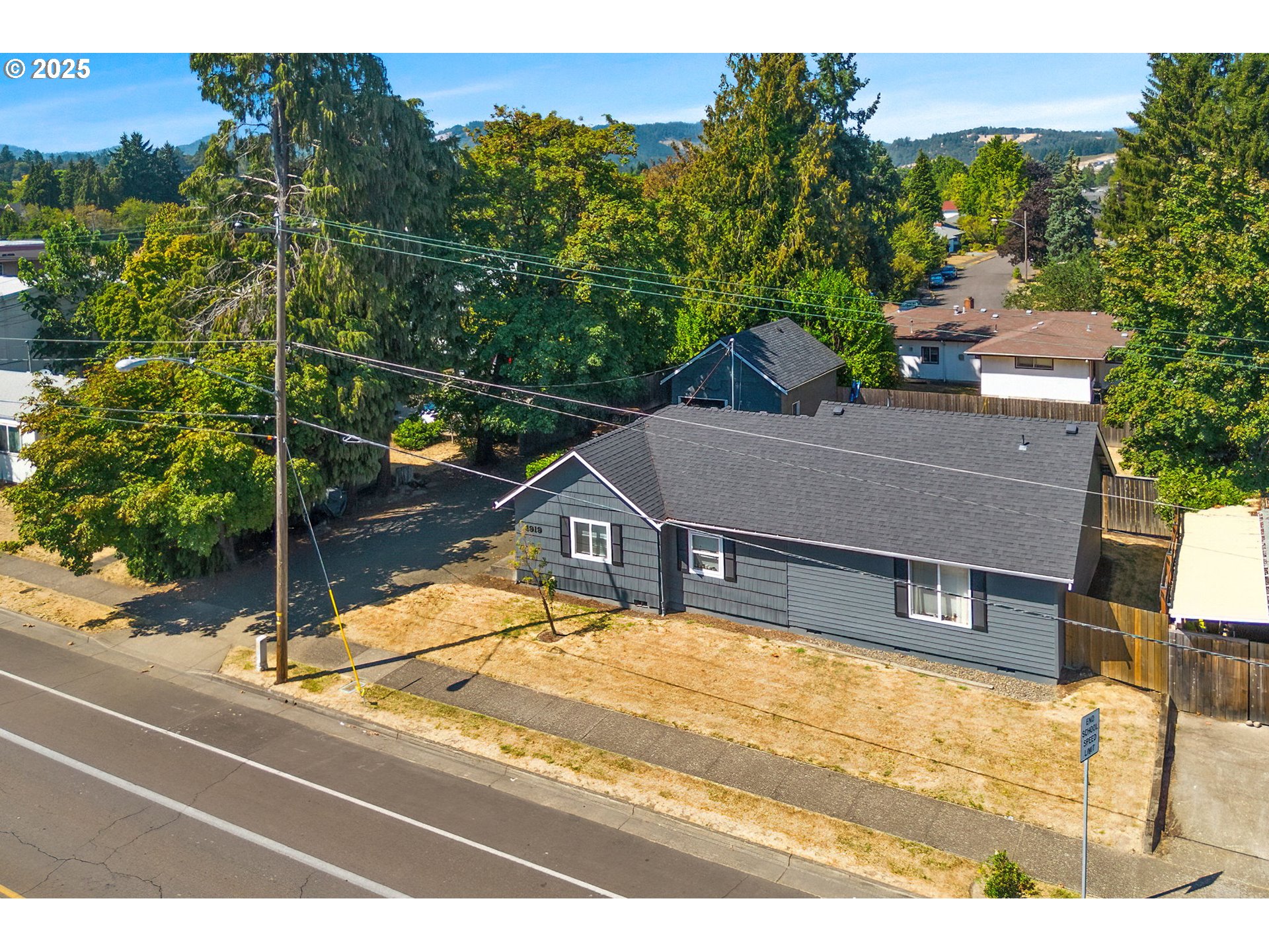 1919 Northwest Buchanan Avenue Corvallis, OR 97330 - Photo 27 of 30 a view of a balcony with a floor to ceiling window and tree