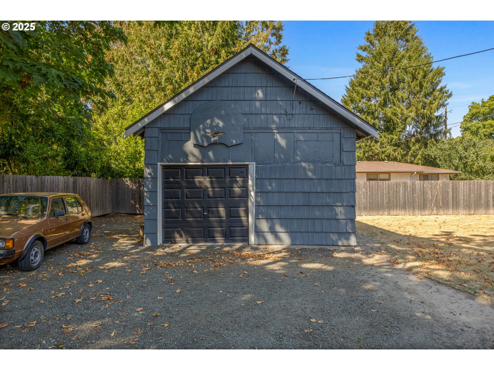 1919 Northwest Buchanan Avenue Corvallis, OR 97330 - Photo 3 of 30 a view of a house with a yard