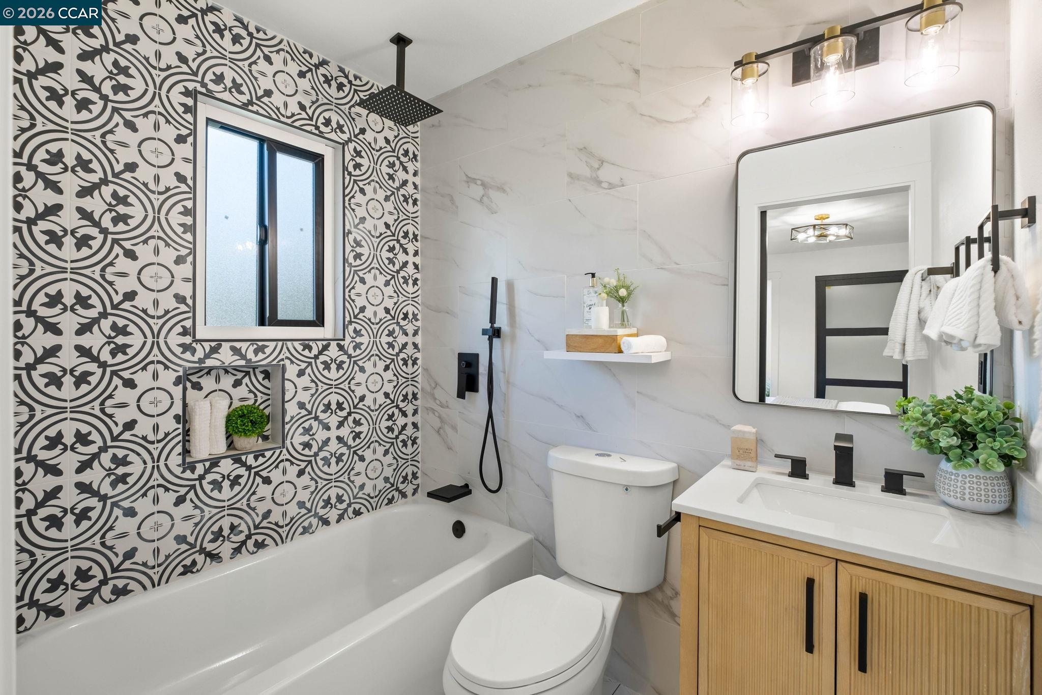 1920 Linden Street Oakland, CA 94607 - Photo 17 of 30 a bathroom with a sink toilet and shower