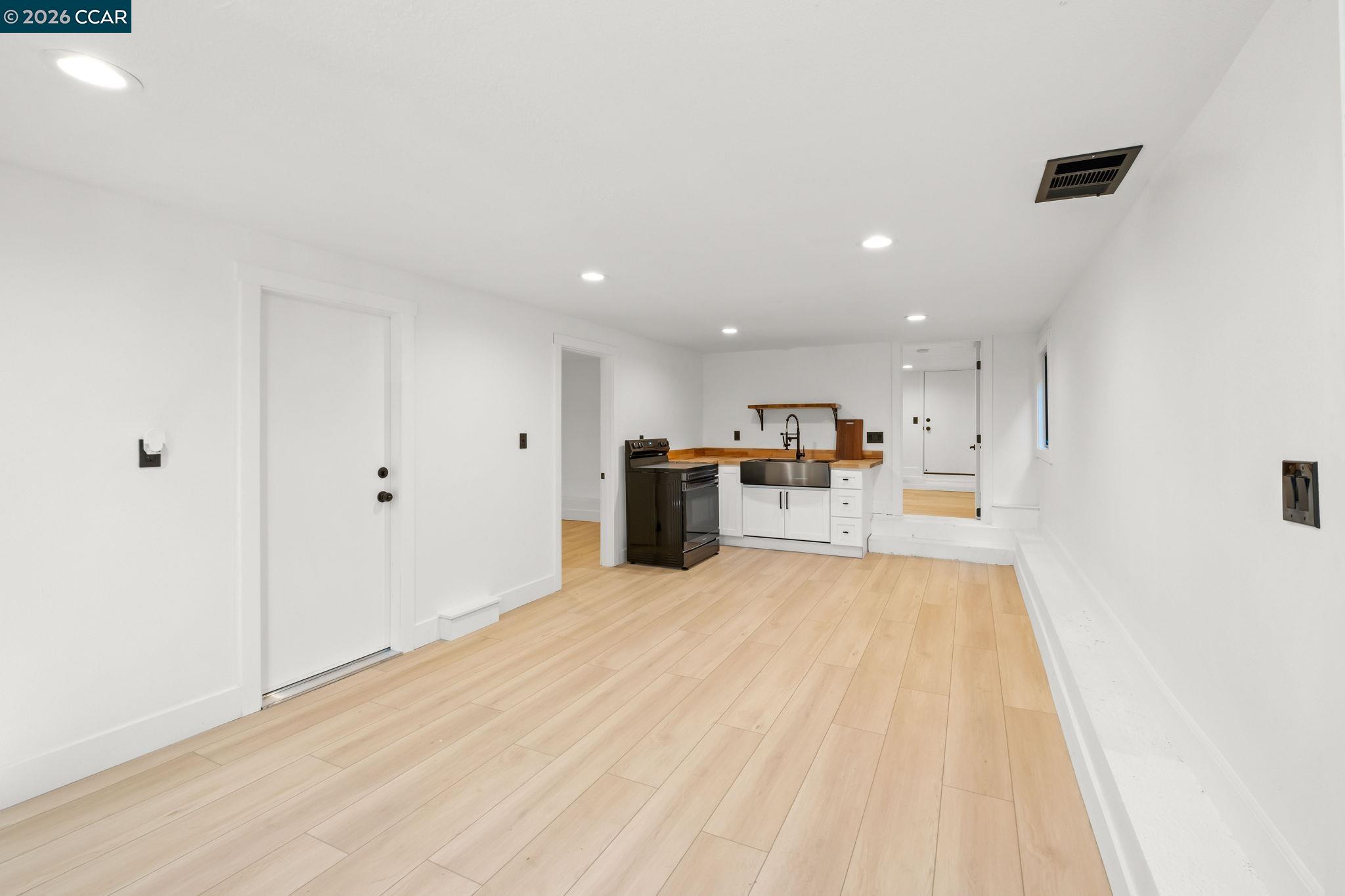 1920 Linden Street Oakland, CA 94607 - Photo 21 of 30 a view of a kitchen with a sink and cabinets