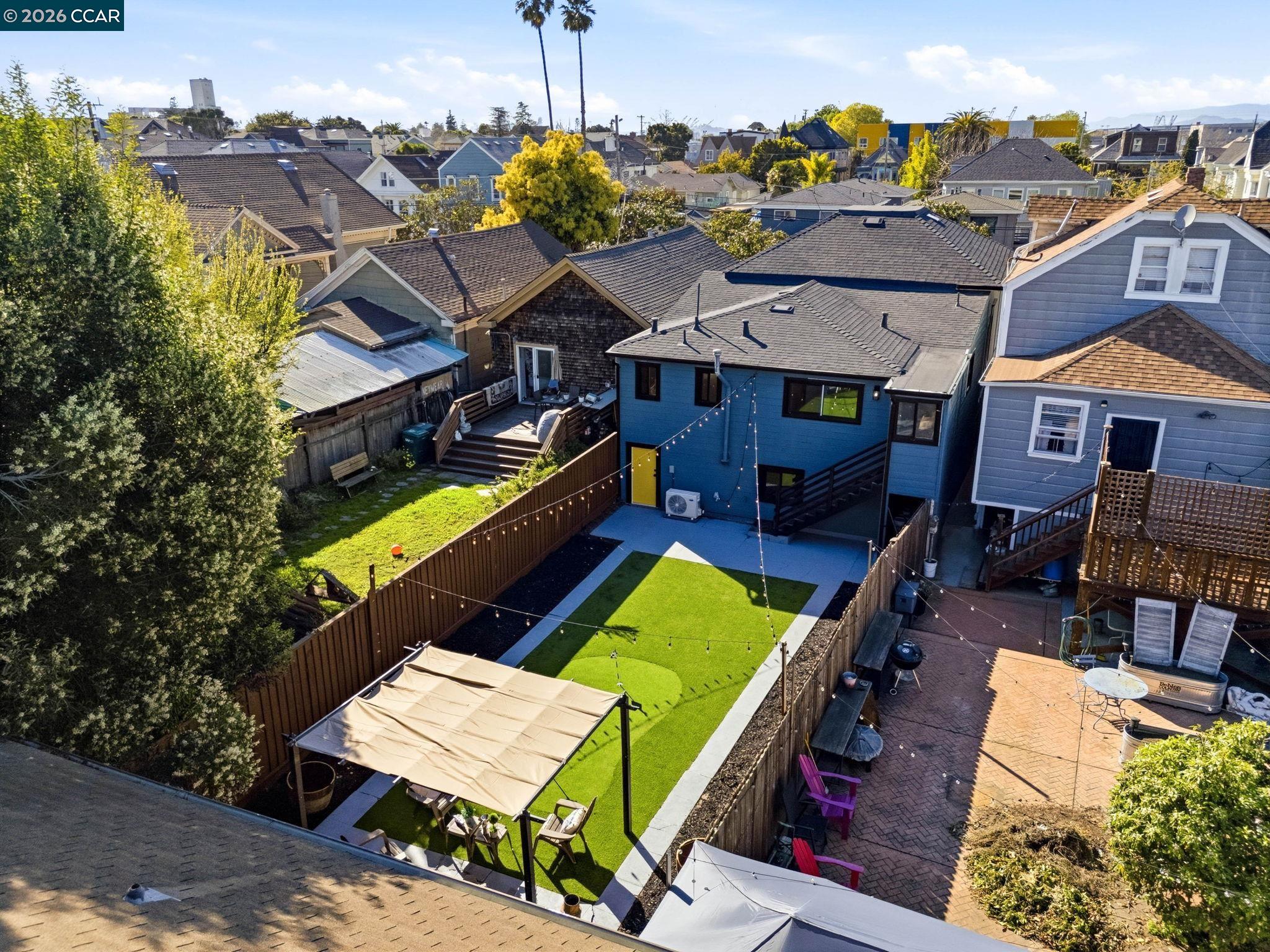 1920 Linden Street Oakland, CA 94607 - Photo 29 of 30 an aerial view of a house with a garden and lake view