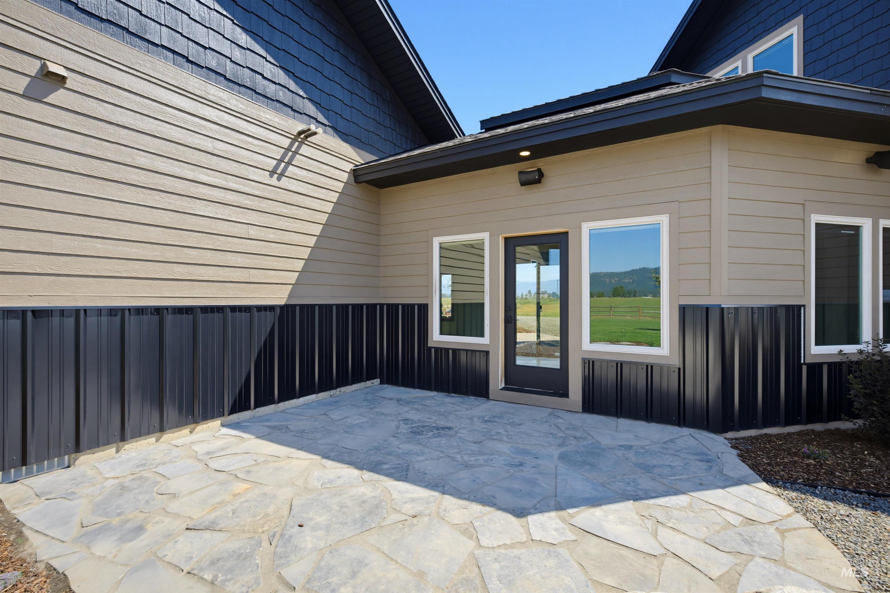 13945 Galloping Road McCall, ID 83638 - Photo 47 of 50 Exterior patio featuring flagstone paving