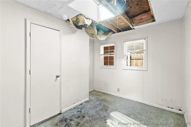 an empty room with windows