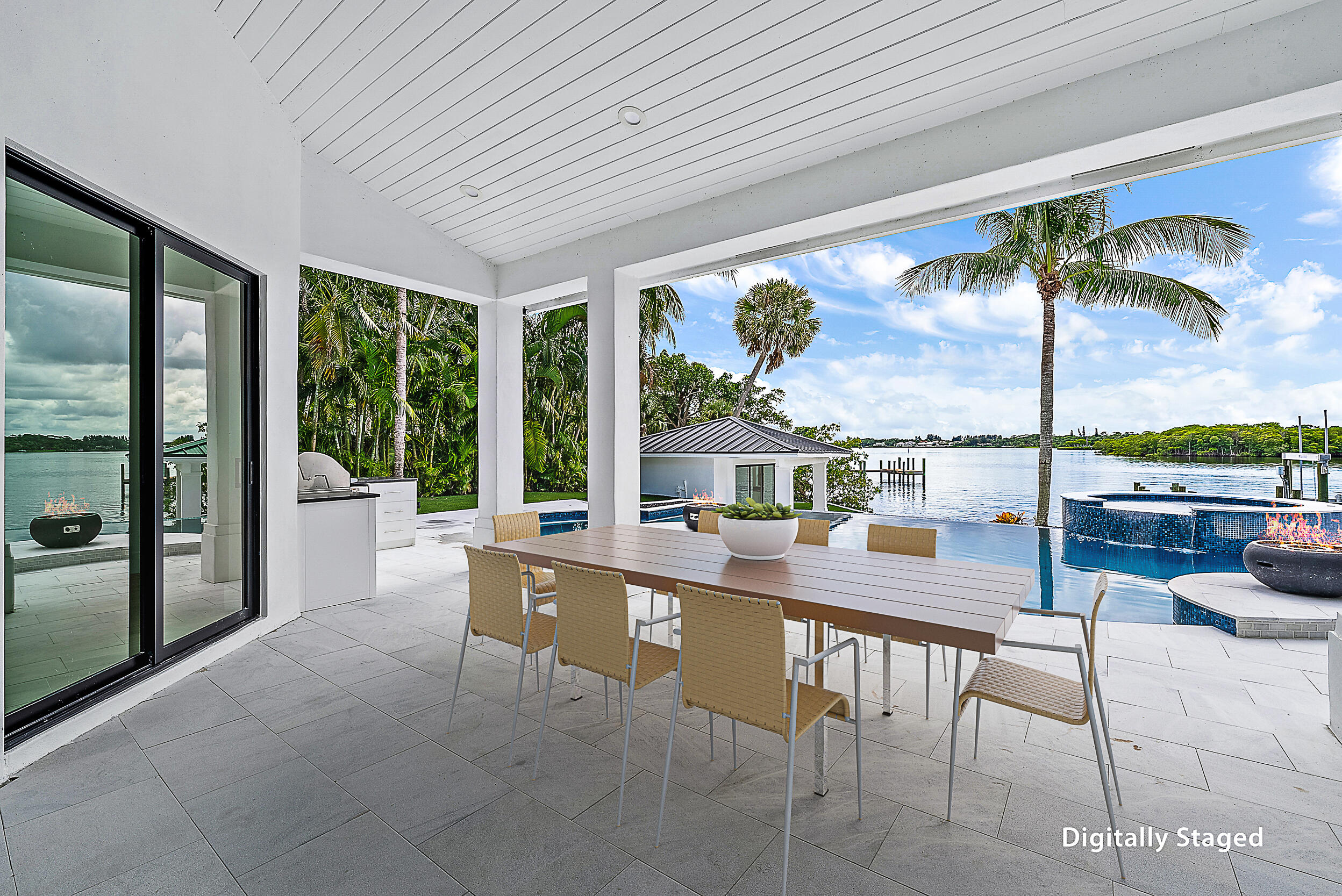 9460 Southeast Point Terrace Jupiter, FL 33469 - Photo 33 of 38 a room with furniture and large windows