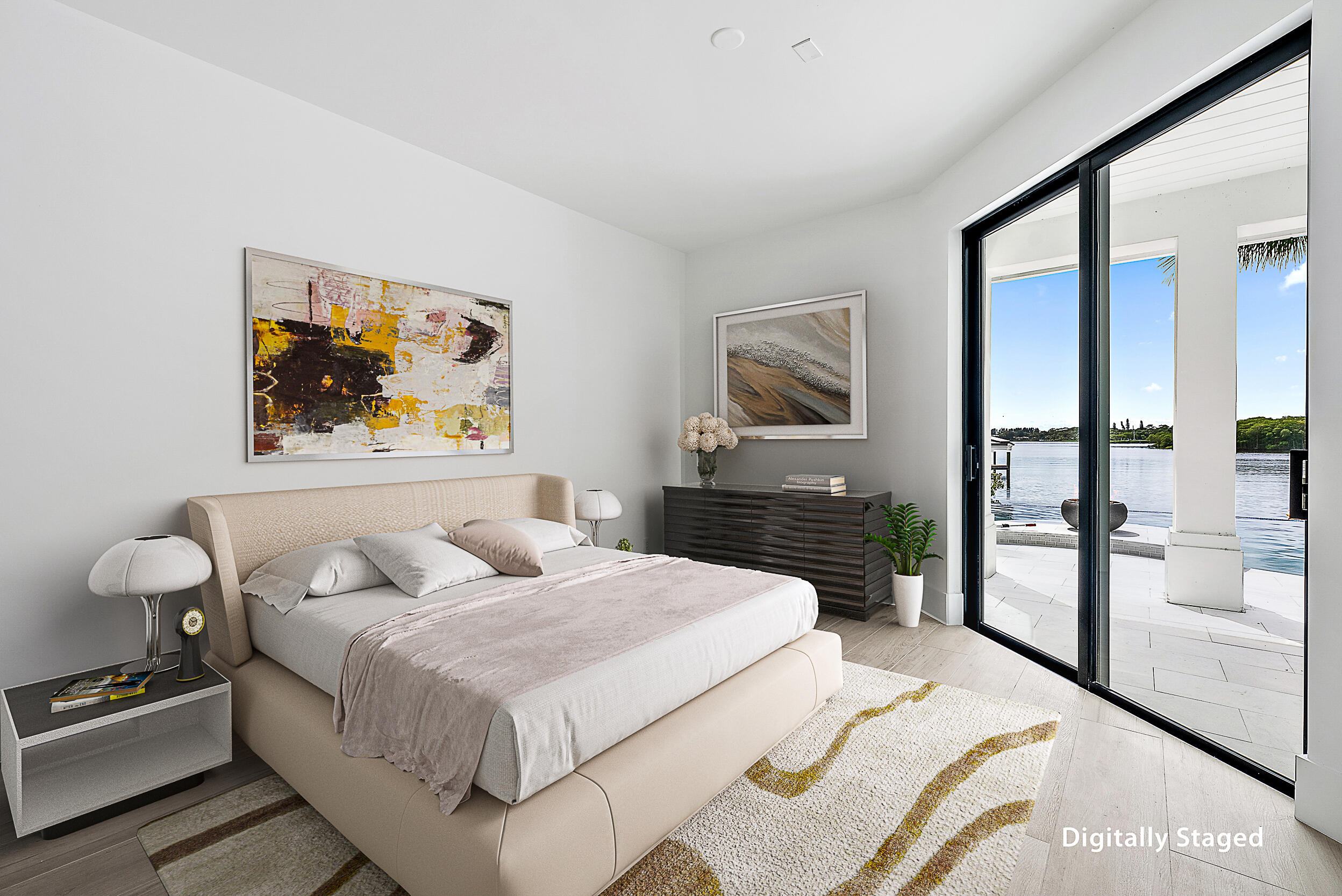 9460 Southeast Point Terrace Jupiter, FL 33469 - Photo 34 of 38 a bedroom with a bed and glass windows