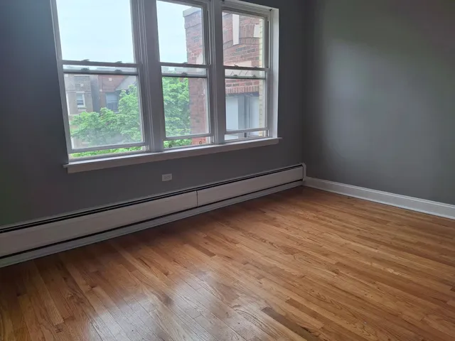 $1,300 | 7011 South Merrill Avenue, Unit 301, Chicago, IL 60649