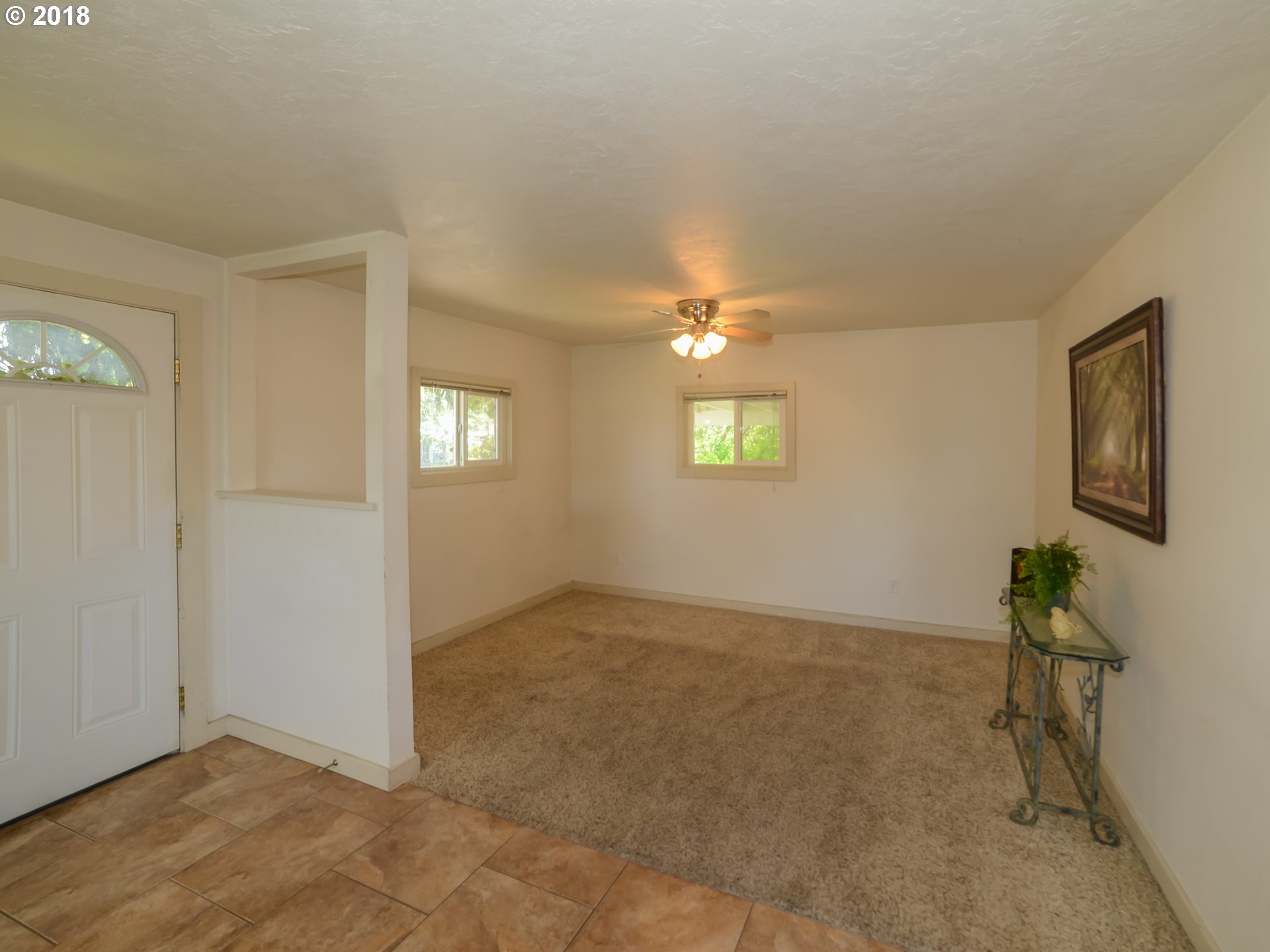 1009 L Street Springfield, OR 97477 - Photo 2 of 5 a view of an empty room with a window