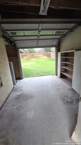 a view of a kitchen and a garage