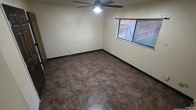 an empty room with windows