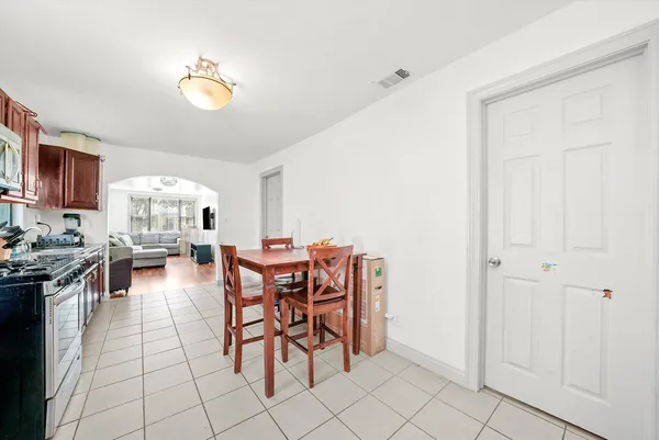 a view of a dining room with furniture