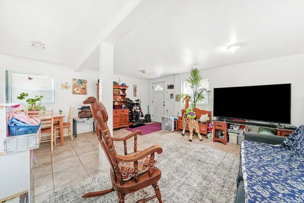 a living room filled with furniture