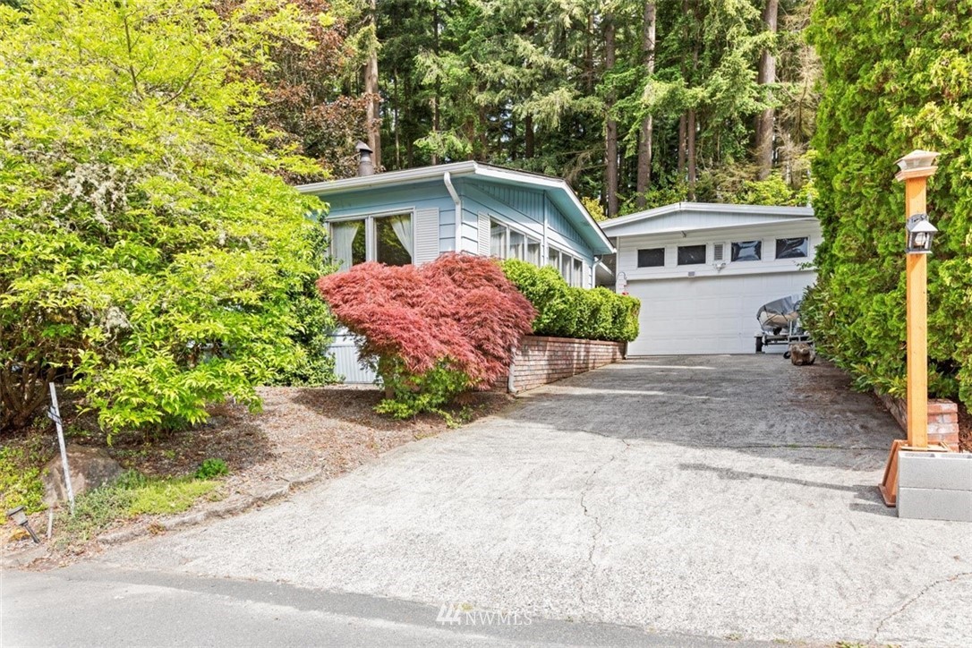 3329 206th Place Southeast Bothell, WA 98012 - Photo 1 of 29 front view of a house with a yard