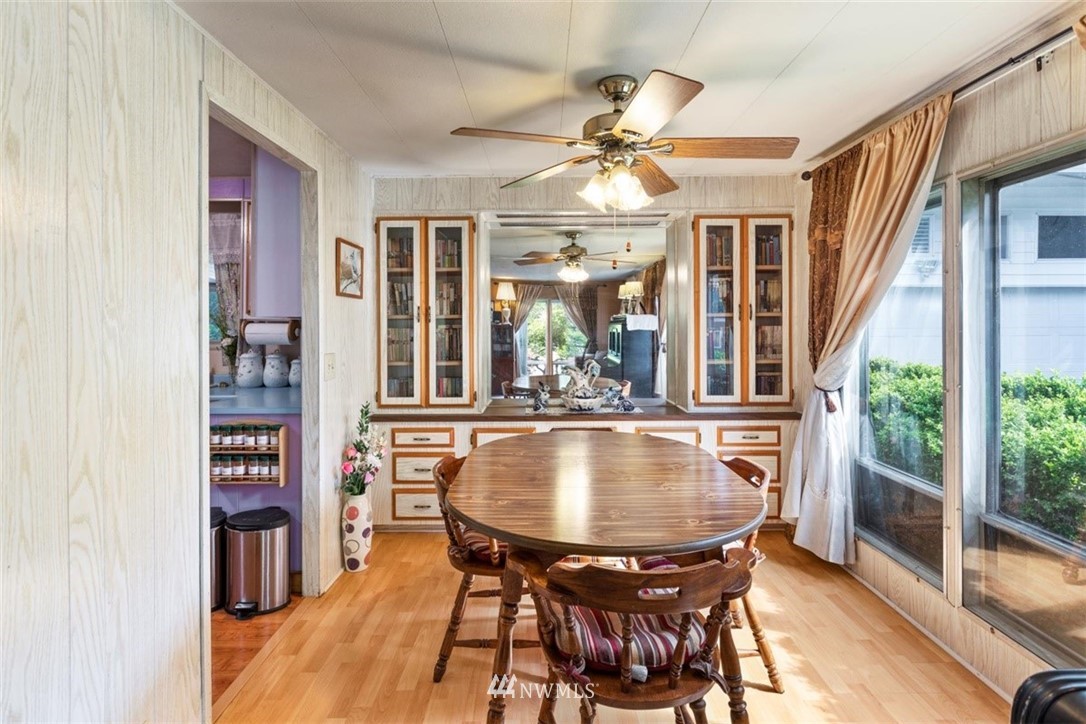 3329 206th Place Southeast Bothell, WA 98012 - Photo 8 of 29 a dining room with furniture and window