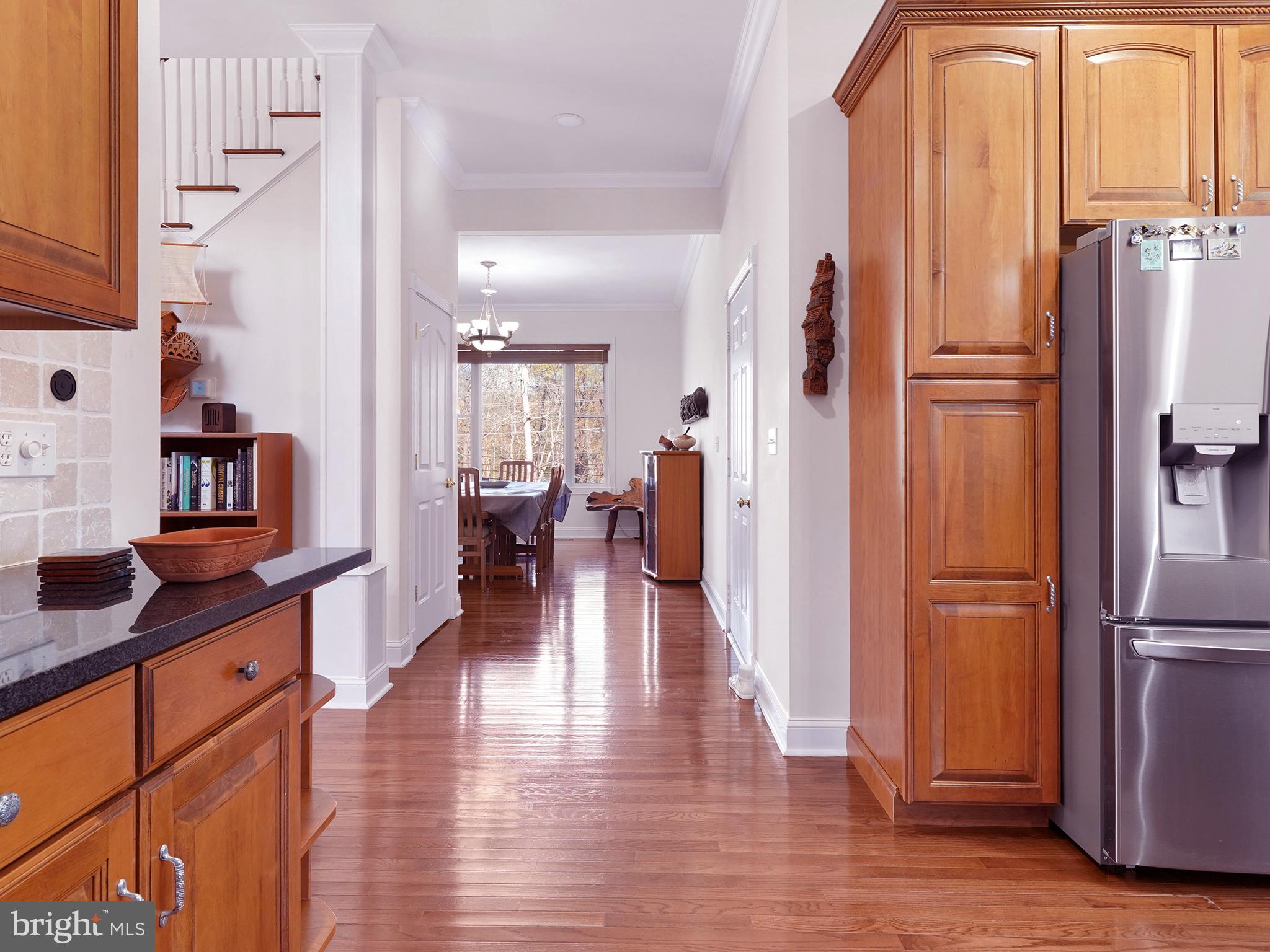 33 North New York Road Galloway Township, NJ 08205 - Photo 24 of 47 a view of a kitchen from the dinning room with furniture and a window