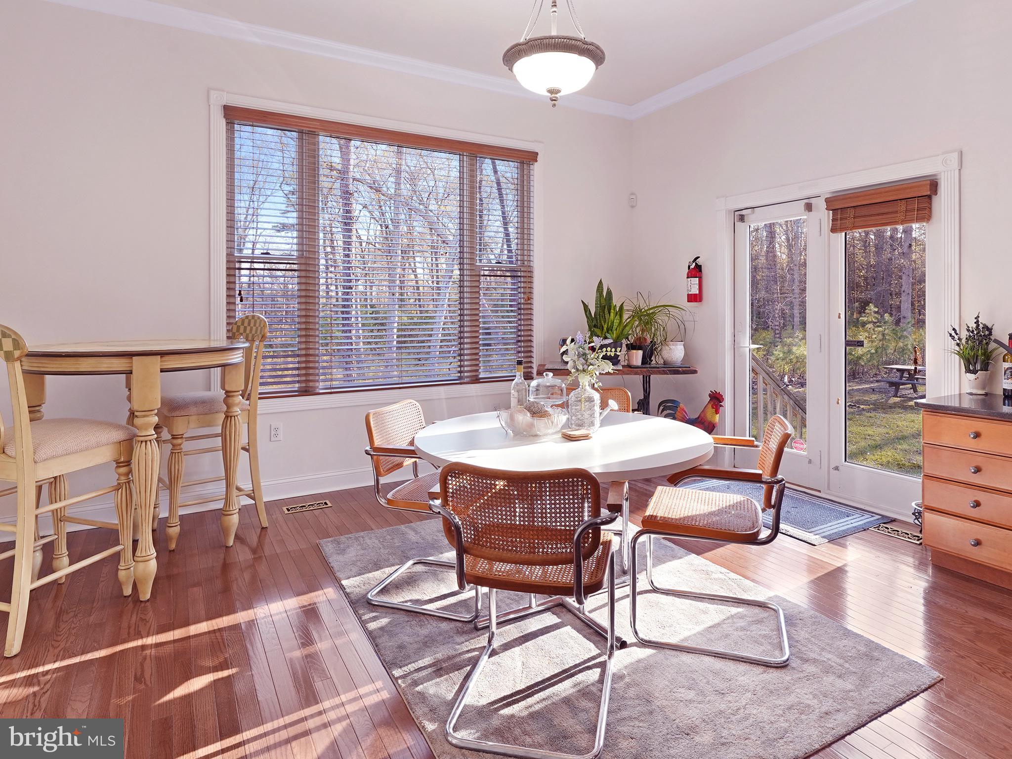 33 North New York Road Galloway Township, NJ 08205 - Photo 25 of 47 a view of a dining room with furniture window and outside view