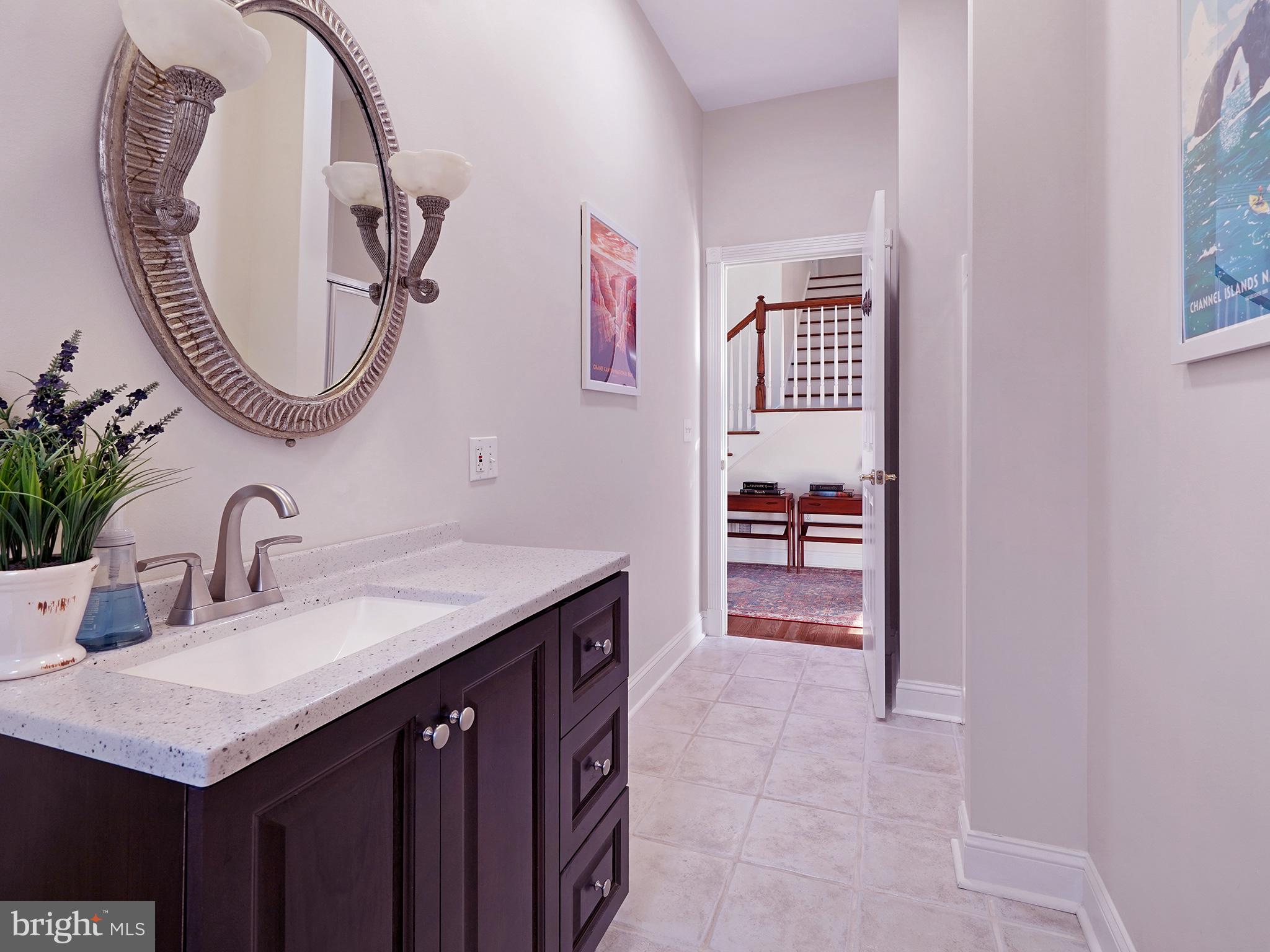 33 North New York Road Galloway Township, NJ 08205 - Photo 28 of 47 a bathroom with a sink and a mirror