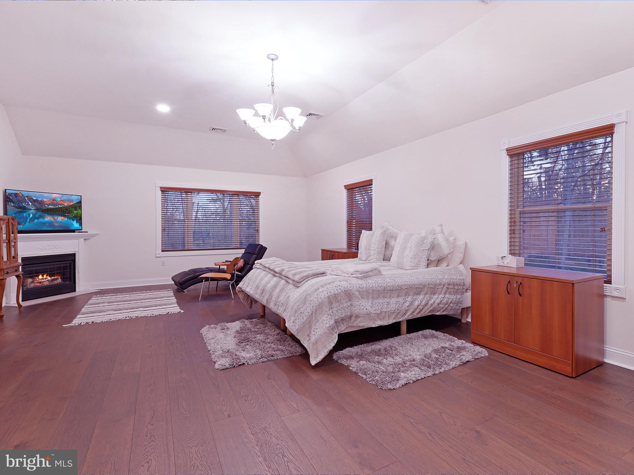 33 North New York Road Galloway Township, NJ 08205 - Photo 30 of 47 a bedroom with furniture and a wooden floor