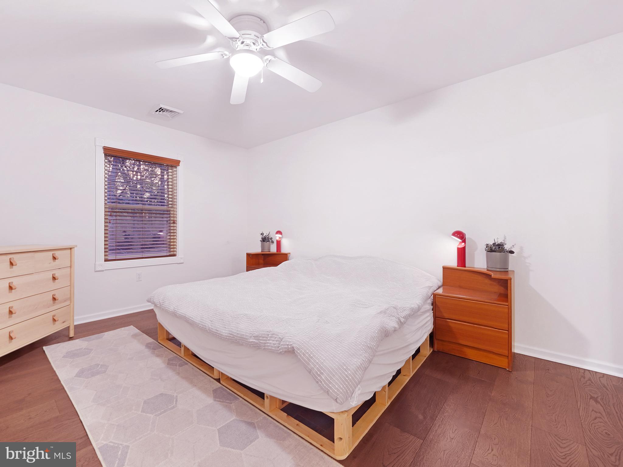 33 North New York Road Galloway Township, NJ 08205 - Photo 36 of 47 a bedroom with a bed and a dresser