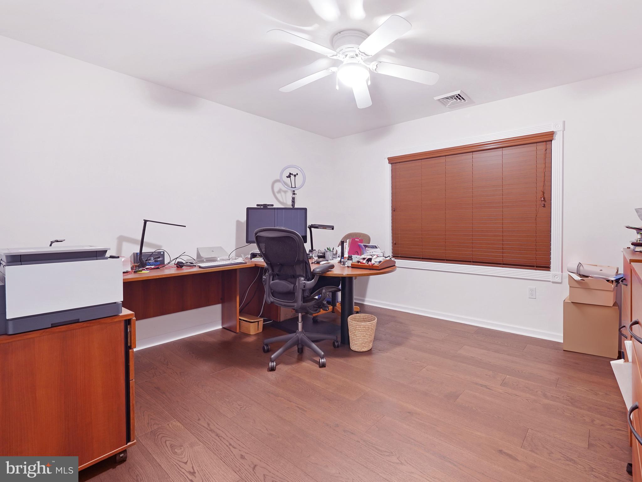 33 North New York Road Galloway Township, NJ 08205 - Photo 37 of 47 a view of a workspace with furniture and a chandelier