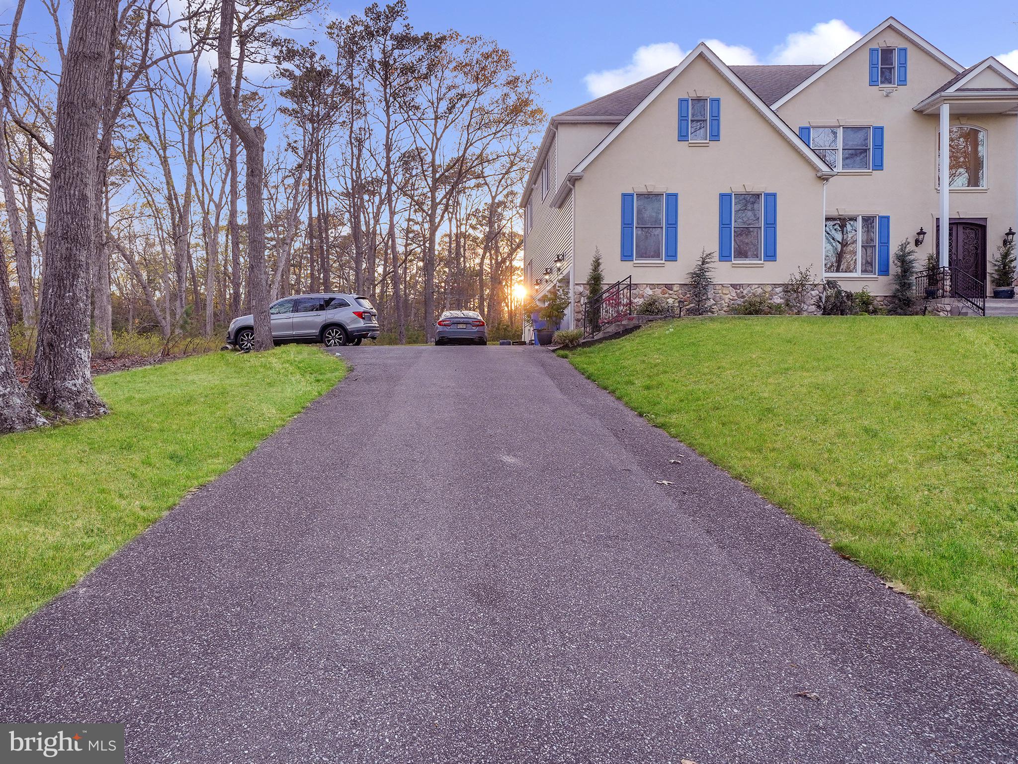 33 North New York Road Galloway Township, NJ 08205 - Photo 4 of 47 a front view of house with yard and green space