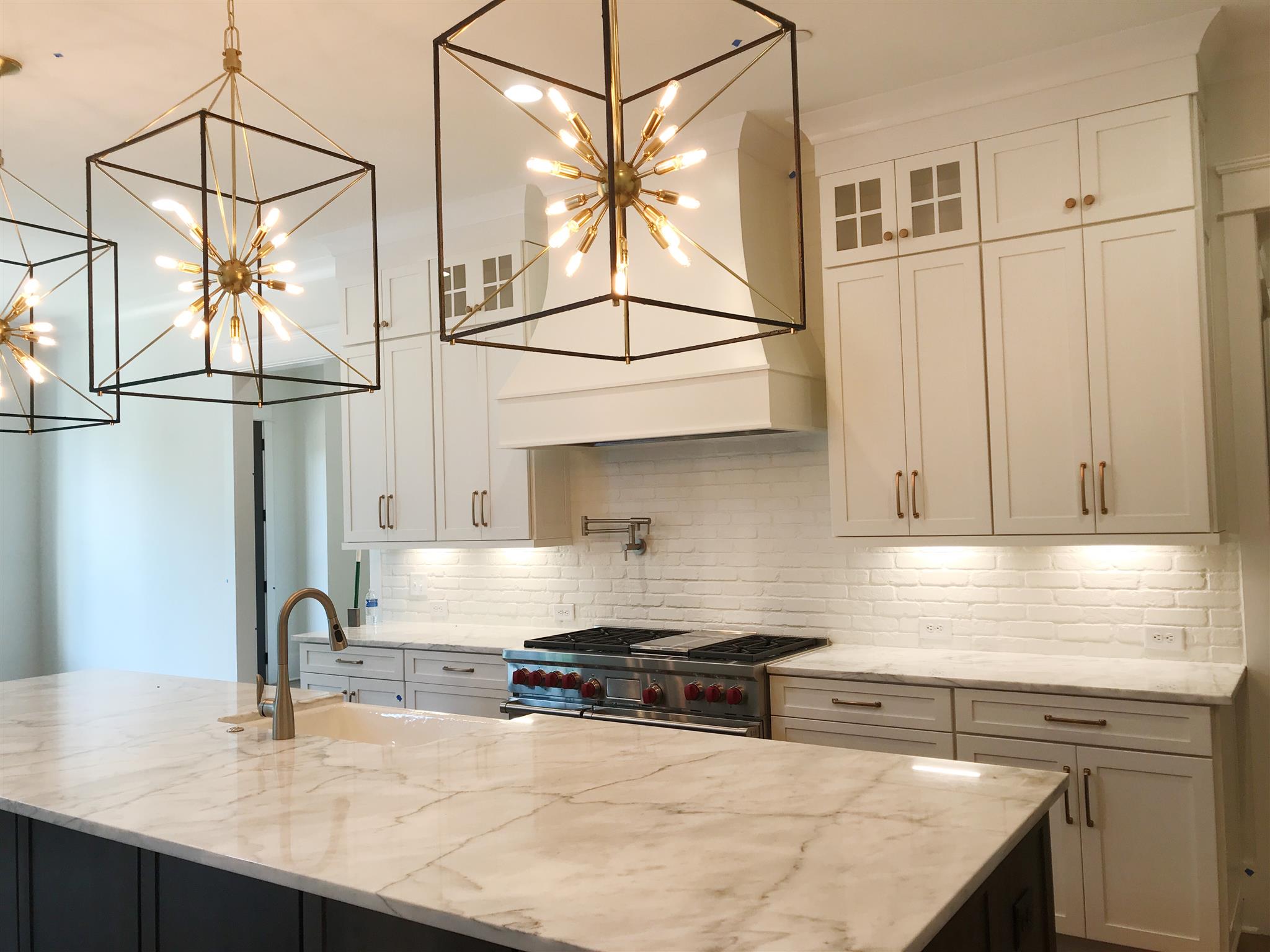1019 Firestone Drive Franklin, TN 37067 - Photo 3 of 10 a kitchen with stainless steel appliances granite countertop a sink and cabinets