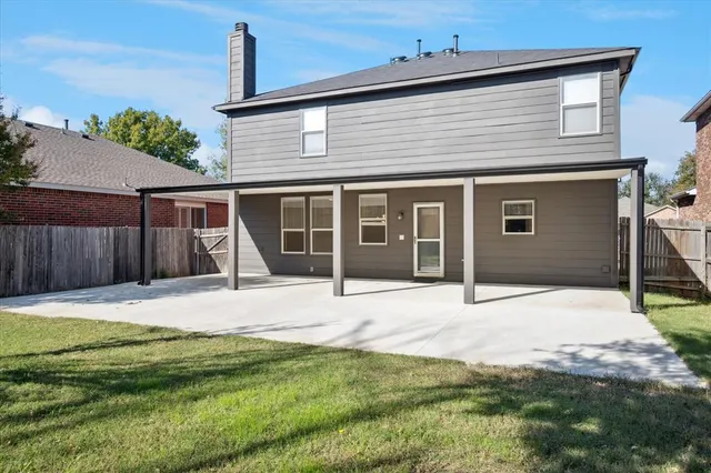 a house with yard in front of it