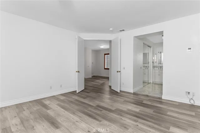 wooden floor and bathroom in a room