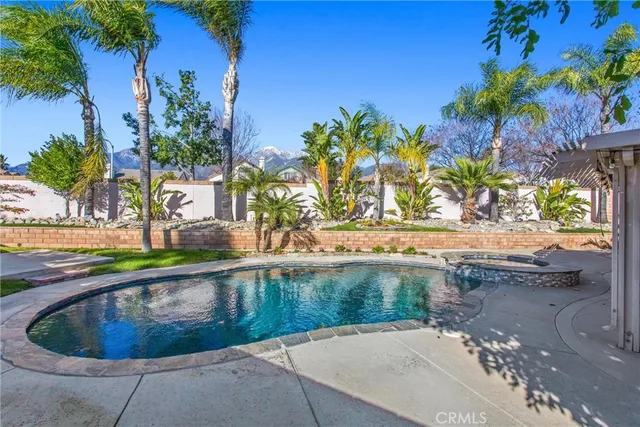 a view of swimming pool from a outdoor space