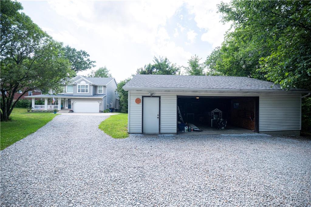 435 Cottage Lane Monroeville, PA 15146 - Photo 41 of 46 Car enthusiasts, hobbyists, and those needing extra storage will appreciate the oversized detached garage with newer roof and an upper-level storage loft.