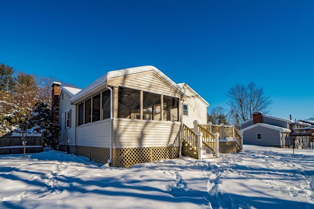 19 Longmeadow Road Medfield, MA 02052 - Photo 25 of 30 a front view of a house with a yard