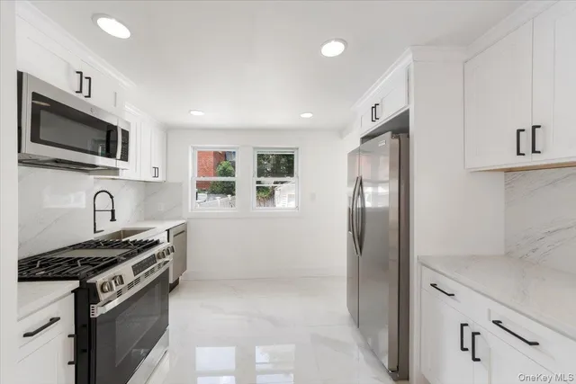 $789,999 | 104-17 Rosita Place | South Ozone Park