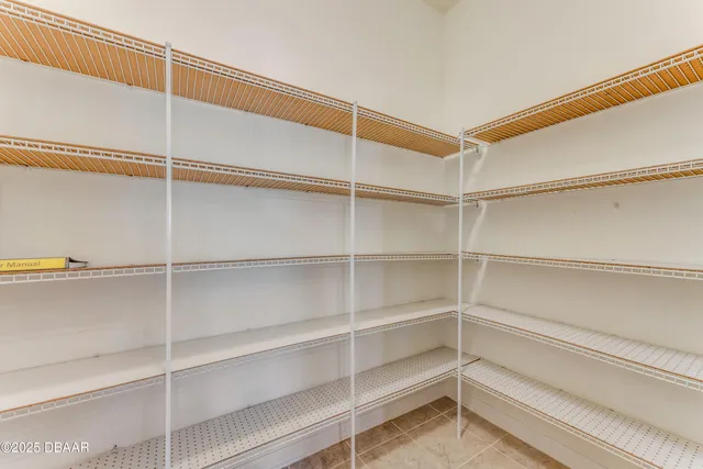 a view of an empty room with empty racks