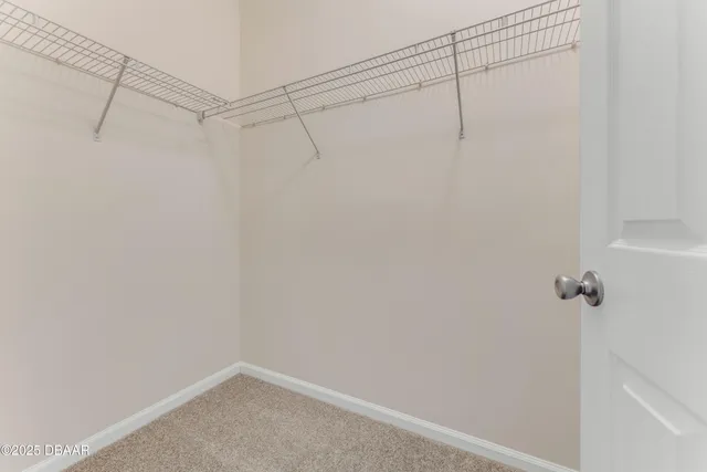 a view of a room with racks on the wall