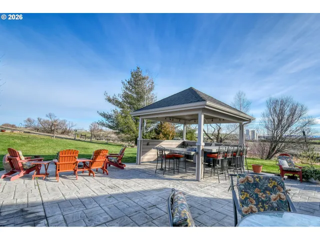 a garden view with a seating space