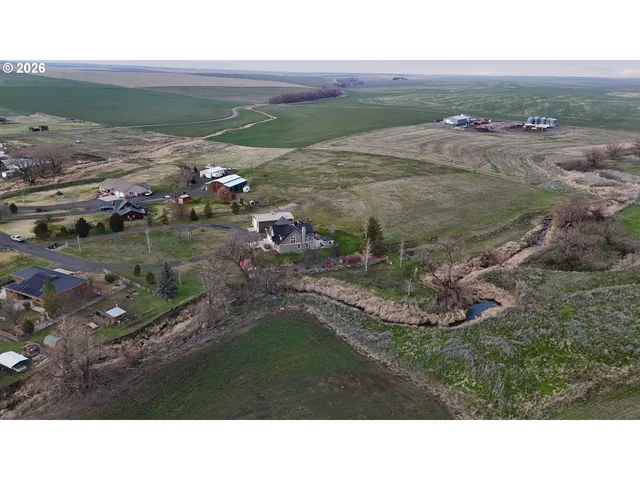 a black and white photo of a beach