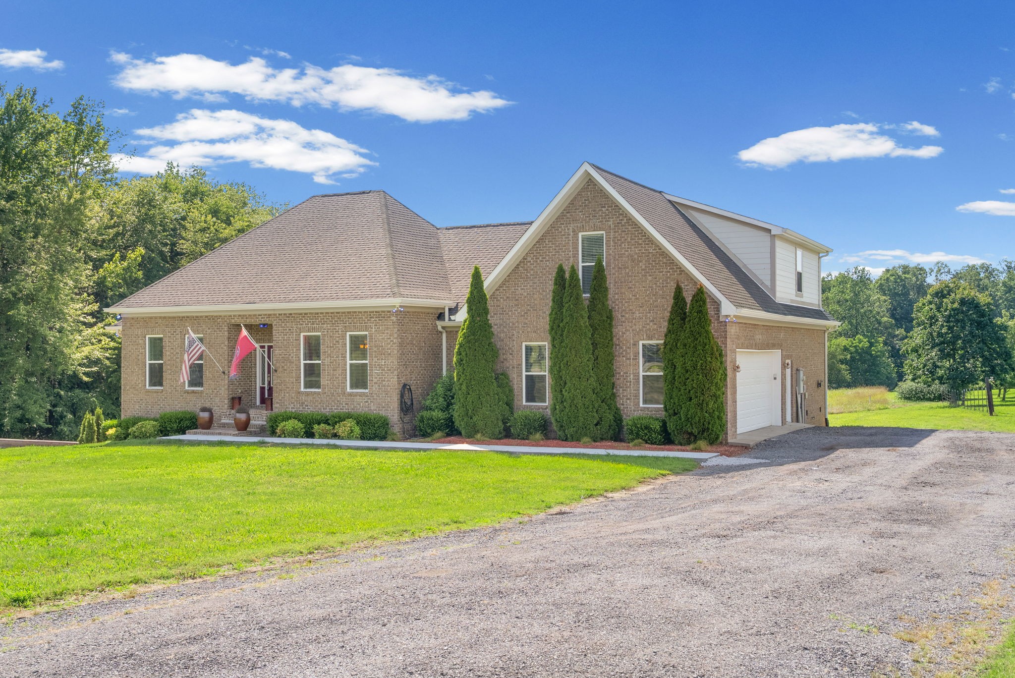 4940 Marion Road Cunningham, TN 37052 - Photo 42 of 43 a view of a house with a yard and swimming pool