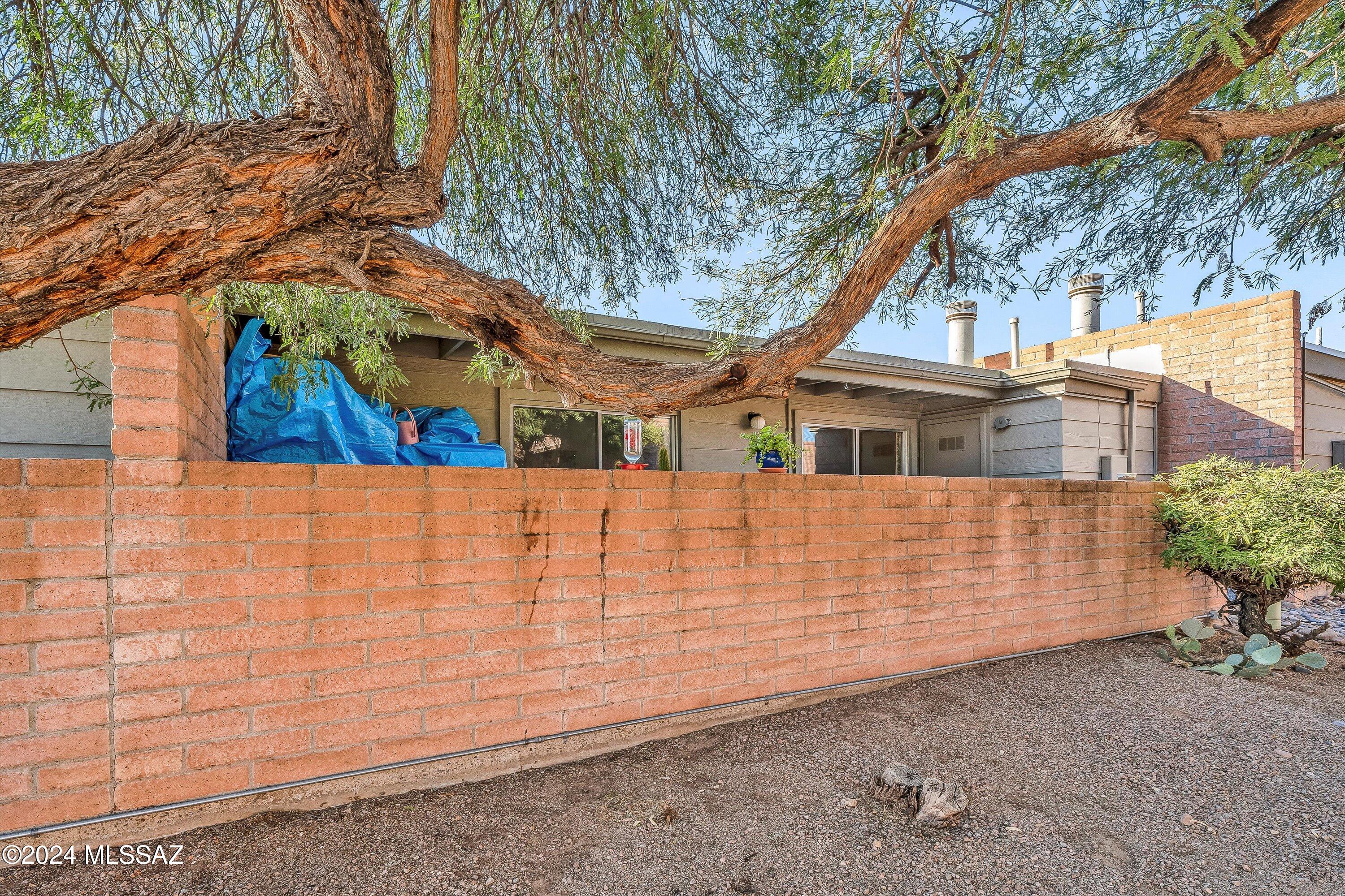 4309 East Presidio Road Tucson, AZ 85712 - Photo 25 of 28 a view of a house with a fence