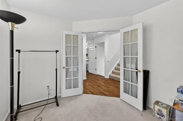 a view of entryway and hall with a couch