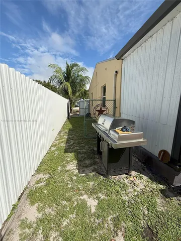 a view of a garden with a fountain