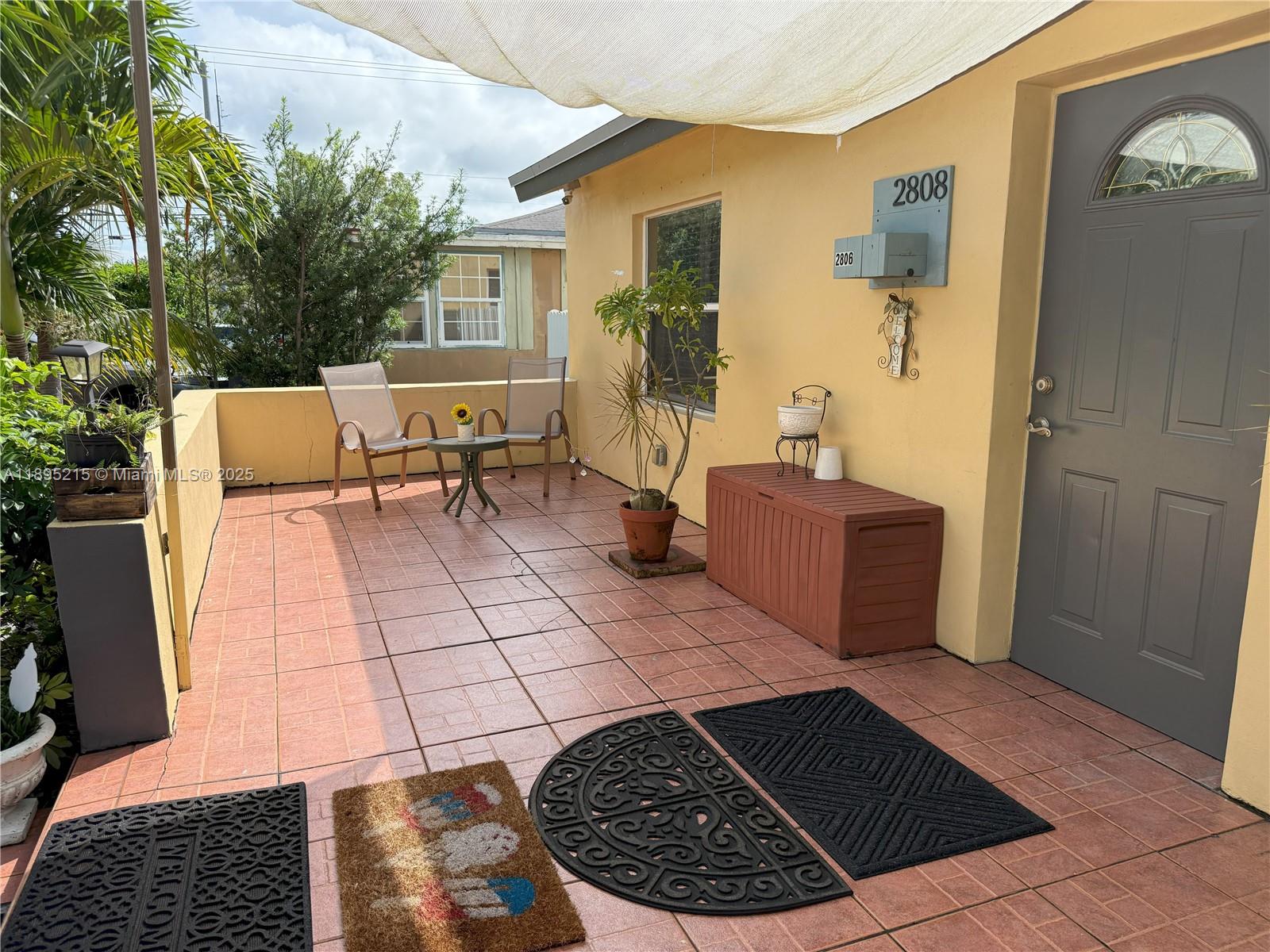2808 Rodman Street Hollywood, FL 33020 - Photo 16 of 19 a view of a house with backyard and sitting area