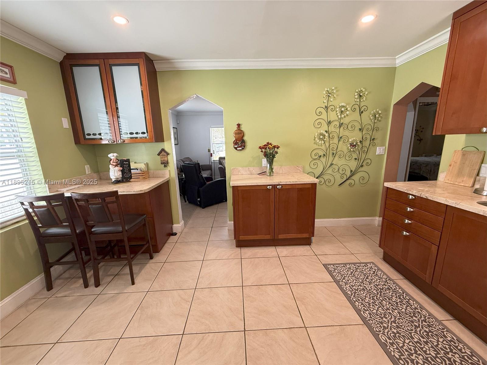 2808 Rodman Street Hollywood, FL 33020 - Photo 5 of 19 a room with a couch and a view of kitchen