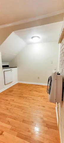a bathroom with a granite countertop sink and vanity