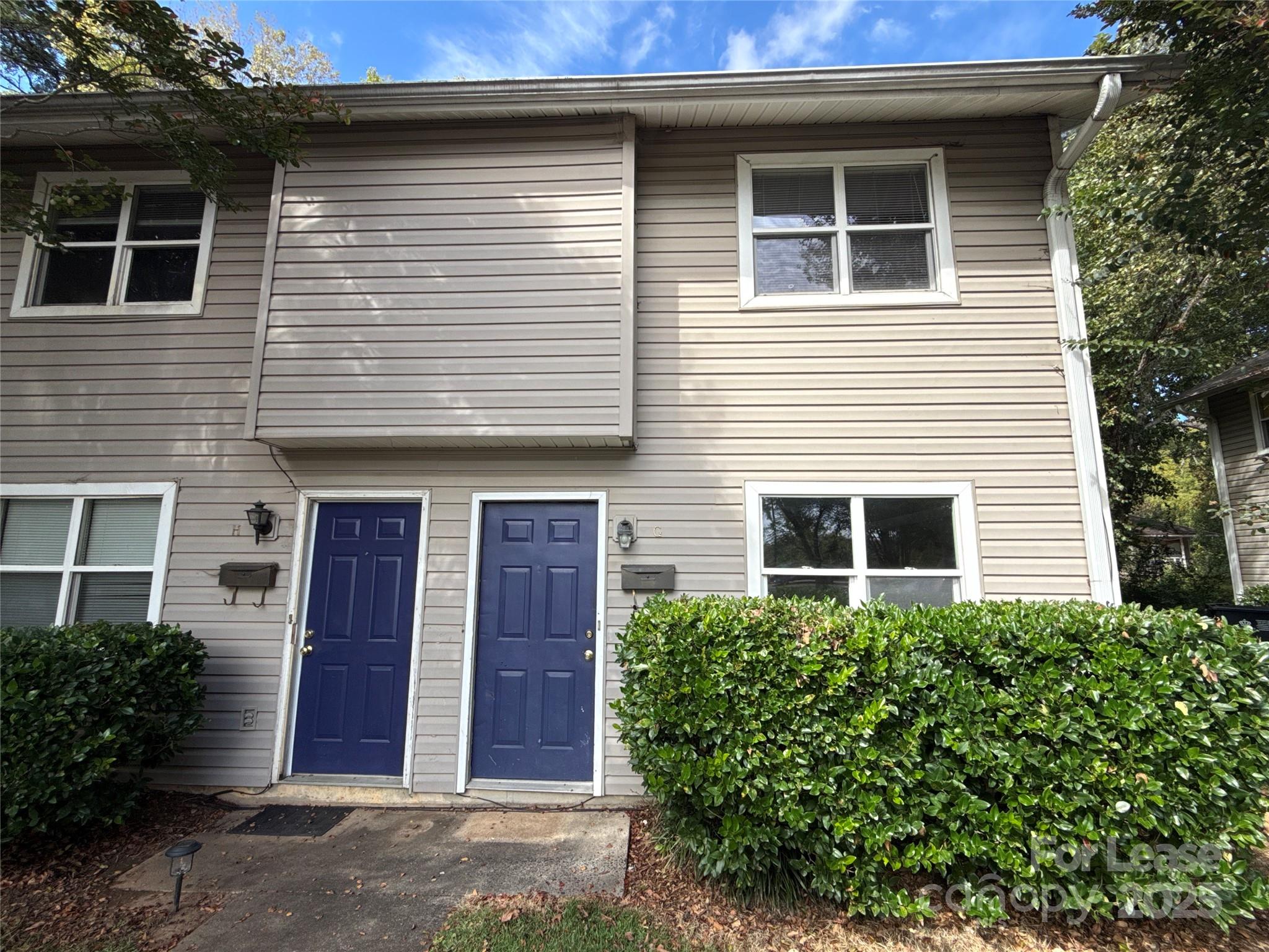a front view of house with yard