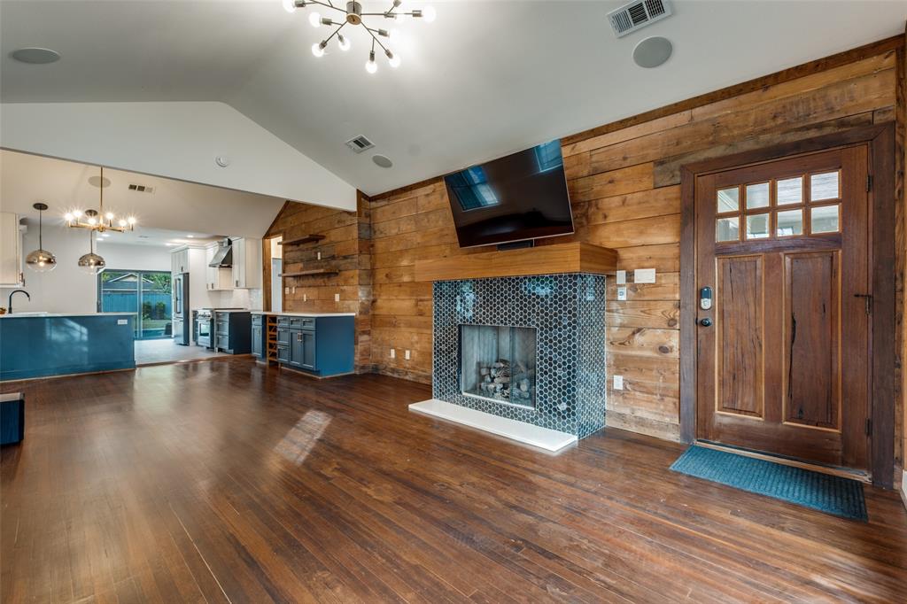 5819 Prospect Avenue Dallas, TX 75206 - Photo 3 of 25 a living room with furniture and a fireplace