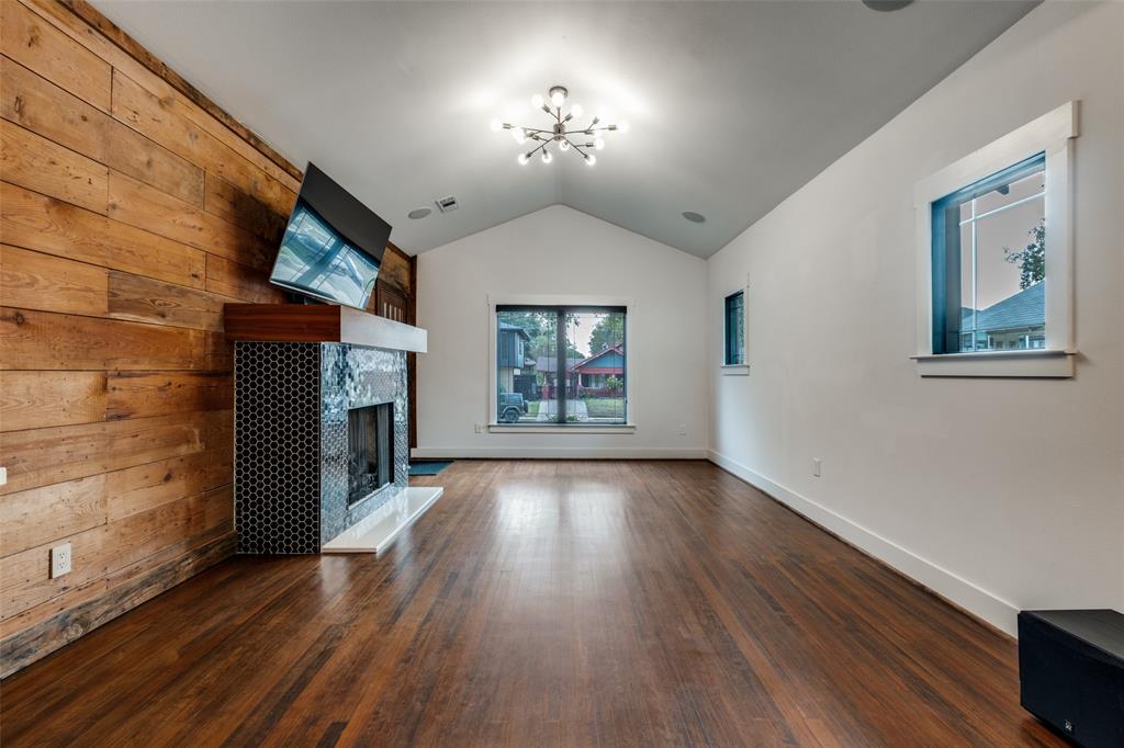 5819 Prospect Avenue Dallas, TX 75206 - Photo 4 of 25 wooden floor in an empty room with a window