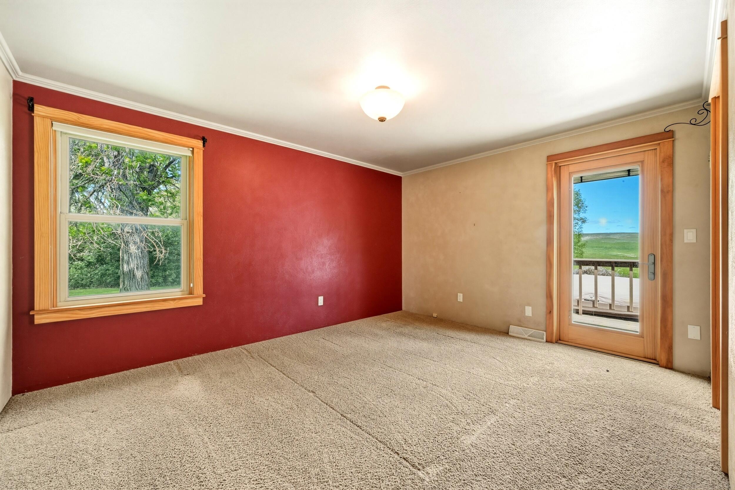 157 Upper Prairie Dog Road Banner, WY 82832 - Photo 39 of 71 140 Primary bedroom