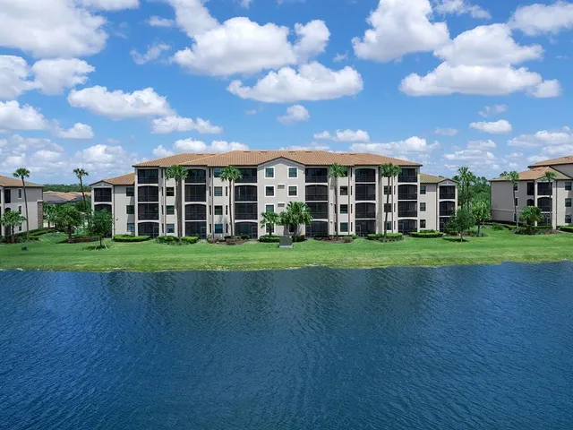 a view of a house with a big yard